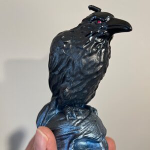 Raven on a Skull Candle